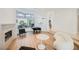 Spacious living room with fireplace, grand piano and sunlit atrium at 2805 High Sail Ct, Las Vegas, NV 89117