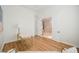 Bright office space with hardwood flooring, modern desk, and entry to another room at 2805 High Sail Ct, Las Vegas, NV 89117