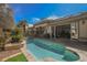 Backyard pool and spa with a covered patio area that makes indoor outdoor living easy at 2805 High Sail Ct, Las Vegas, NV 89117