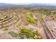 Aerial view featuring a well-maintained golf course and scenic community at 2864 Sumter Valley Cir, Henderson, NV 89052