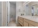 Bathroom featuring a soaking tub and a double vanity with ample counter space at 2864 Sumter Valley Cir, Henderson, NV 89052