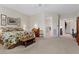 A Primary bedroom features natural lighting, neutral walls, carpet floors, and a ceiling fan at 2864 Sumter Valley Cir, Henderson, NV 89052