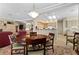 Cozy dining area adjacent to the kitchen and living room with skylight at 2864 Sumter Valley Cir, Henderson, NV 89052