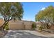 Charming home with a three-car garage, manicured landscaping and mature shade trees at 2864 Sumter Valley Cir, Henderson, NV 89052