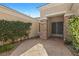 Inviting covered front porch with stone accents and tiled floor at 2864 Sumter Valley Cir, Henderson, NV 89052