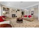 Inviting living room with fireplace, decorative rug, and neutral color palette at 2864 Sumter Valley Cir, Henderson, NV 89052