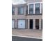 Charming townhouse with a two-car garage and attractive architectural details at 32 Via Vasari # 103, Henderson, NV 89011