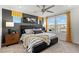 Stylish bedroom with a large window, ceiling fan, and modern decor at 321 Cymbal Pl # Lot 130, Henderson, NV 89015