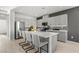Modern kitchen featuring stainless steel appliances and a large center island with seating at 321 Cymbal Pl # Lot 130, Henderson, NV 89015