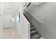 Clean and modern staircase with gray carpet and white walls at 321 Cymbal Pl # Lot 130, Henderson, NV 89015
