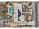 Overhead view of a home with solar panels, pool and desert landscaping at 3290 Vicki Ave, Las Vegas, NV 89139