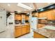 Well-equipped kitchen features granite countertops, stainless steel appliances, and ample cabinet space at 3290 Vicki Ave, Las Vegas, NV 89139