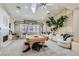 Bright living room featuring a pool table, fireplace, and a comfortable seating area with stylish decor at 3290 Vicki Ave, Las Vegas, NV 89139