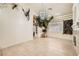 Bright living room with tile flooring, decorative lighting, and a cozy fireplace at 3290 Vicki Ave, Las Vegas, NV 89139