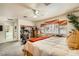 Bright main bedroom showcasing a comfortable bed, exercise equipment, and ample space at 3290 Vicki Ave, Las Vegas, NV 89139