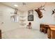 Bright home office featuring tile floors, natural light, and built-in shelves at 3290 Vicki Ave, Las Vegas, NV 89139