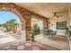 Charming patio with a brick-paved floor and cozy seating, perfect for enjoying the outdoors at 3290 Vicki Ave, Las Vegas, NV 89139