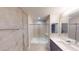 Bathroom features modern fixtures, tile floors, and a shower over tub at 353 E Bonneville Ave # 125, Las Vegas, NV 89101