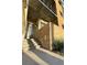 Exterior entryway with stone accents, leading to a secure building entrance at 353 E Bonneville Ave # 125, Las Vegas, NV 89101