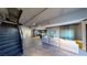 Spacious modern living room with sleek staircase and open-concept kitchen, perfect for entertaining at 353 E Bonneville Ave # 125, Las Vegas, NV 89101