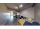 Spacious living room featuring a vibrant sectional sofa at 353 E Bonneville Ave # 125, Las Vegas, NV 89101