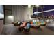 Community outdoor movie area with comfortable seating and a large screen at 353 E Bonneville Ave # 125, Las Vegas, NV 89101