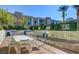 Community outdoor kitchen and dining area with modern grills and ample seating at 353 E Bonneville Ave # 125, Las Vegas, NV 89101