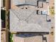 Overhead shot captures the roof and patio of a home, highlighting outdoor living features and manicured landscaping at 356 Silva Pl, Henderson, NV 89011