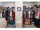 Walk-in closet providing ample storage space with shelving and hanging racks for organization at 356 Silva Pl, Henderson, NV 89011