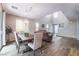 Inviting dining space with modern lighting fixtures and seamless flow into the living room at 356 Silva Pl, Henderson, NV 89011