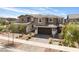 Well-maintained two-story home with a two-car garage and mature landscaping, offering great curb appeal at 356 Silva Pl, Henderson, NV 89011