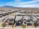 Aerial view showcases the layout of neighborhood houses, highlighting streetscapes, landscaping, and a sunny residential area at 356 Silva Pl, Henderson, NV 89011