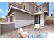 Cozy front patio with comfortable seating and a 'Welcome' sign, perfect for relaxing outdoors at 356 Silva Pl, Henderson, NV 89011
