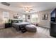 Spacious main bedroom with a ceiling fan, neutral walls, carpet and natural light at 356 Silva Pl, Henderson, NV 89011