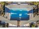 Overhead shot of the community pool with clearly marked lanes, sunbathing chairs, and shaded seating at 356 Silva Pl, Henderson, NV 89011