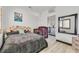 Bedroom featuring hardwood floors, crib, toddler bed, modern accents, and a view of the upstairs hallway at 3738 Falcon Springs Dr, Las Vegas, NV 89147