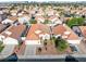 An aerial shot showcases this residential neighborhood with well-maintained homes and lush landscaping at 3854 Spruceview Ct, Las Vegas, NV 89147