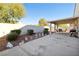 The spacious backyard with covered patio creates a private retreat for outdoor enjoyment and relaxation at 3854 Spruceview Ct, Las Vegas, NV 89147