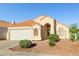 Charming single-story home with a well-maintained landscape and a red tile roof at 3854 Spruceview Ct, Las Vegas, NV 89147