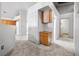 Hallway with a cabinet, and entrances to the kitchen and other rooms at 3854 Spruceview Ct, Las Vegas, NV 89147
