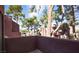 Exterior view from balcony overlooking mature trees at 4050 Pacific Harbors Dr # 245, Las Vegas, NV 89121