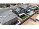 Well-maintained property with covered patio, artificial turf, and close proximity to community amenities at 438 Shimmering Sands Ave, North Las Vegas, NV 89031
