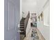 Bright entryway with wood flooring, staircase, 