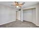 Bedroom featuring new carpet, a closet, and neutral paint, offering a cozy atmosphere at 4905 Ocean Shores Way, Las Vegas, NV 89130