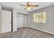 Bedroom with a closet, a window for natural light, carpet flooring and a ceiling fan at 4905 Ocean Shores Way, Las Vegas, NV 89130