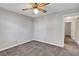Bedroom featuring new carpet, neutral paint, and an attached hallway at 4905 Ocean Shores Way, Las Vegas, NV 89130