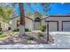 Charming single-story home with well-manicured front yard and two-car garage at 4905 Ocean Shores Way, Las Vegas, NV 89130