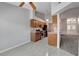 This kitchen features wood cabinets and stainless steel appliances and sink at 4905 Ocean Shores Way, Las Vegas, NV 89130