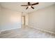 Bedroom with wood-look floors, neutral walls, and bright, natural light make it a comfortable space at 4955 Lindell Rd # 130, Las Vegas, NV 89118