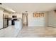 Inviting living room showcasing tile floors, stainless steel appliances, and neutral paint at 4955 Lindell Rd # 130, Las Vegas, NV 89118